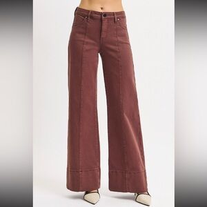 New with tags. Risen jeans. Chocolate brown. Full length wide leg front seam